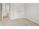 Carpeted bedroom showing base molding and a double door closet at 373 Riverwood Pass, Dallas, GA 30157