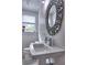 Stylish bathroom featuring a unique sink and ornate mirror, complemented by natural light from the window at 88 Peachtree Memorial Nw Dr # 88, Atlanta, GA 30309