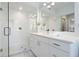 Modern bathroom with a glass shower enclosure, sleek white vanity, and updated fixtures at 88 Peachtree Memorial Nw Dr # 88, Atlanta, GA 30309
