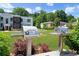 Community grilling area with stainless steel grills and landscaping at 88 Peachtree Memorial Nw Dr # 88, Atlanta, GA 30309