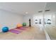 Exercise area with yoga mats, medicine balls, treadmills, and elliptical machine at 88 Peachtree Memorial Nw Dr # 88, Atlanta, GA 30309