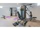 Home gym with multiple weight machines and workout equipment at 88 Peachtree Memorial Nw Dr # 88, Atlanta, GA 30309