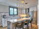 Modern kitchen featuring a center island with bar seating, stainless steel appliances, and stylish pendant lighting at 88 Peachtree Memorial Nw Dr # 88, Atlanta, GA 30309