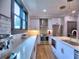Bright, modern kitchen featuring stainless appliances, subway tile backsplash, and designer pendant lighting at 88 Peachtree Memorial Nw Dr # 88, Atlanta, GA 30309