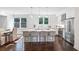 Bright kitchen with island seating, modern appliances, and a dining area for easy entertaining at 88 Peachtree Memorial Nw Dr # 88, Atlanta, GA 30309