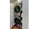 Efficient laundry area featuring a stacked washer and dryer unit at 88 Peachtree Memorial Nw Dr # 88, Atlanta, GA 30309