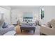 Bright living room showcasing stylish seating arrangement, decorative pillows, and natural light at 88 Peachtree Memorial Nw Dr # 88, Atlanta, GA 30309