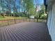 Well-maintained wooden deck providing a view of the surrounding yard and greenery at 920 James Nw Ct, Marietta, GA 30060