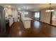 Bright kitchen features a center island with marble countertop and stainless steel appliances at 920 James Nw Ct, Marietta, GA 30060