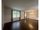 Spacious living room features hardwood floors, natural light, and neutral paint at 920 James Nw Ct, Marietta, GA 30060