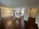 Bright open concept kitchen with island, stainless appliances, and wood floors at 920 James Nw Ct, Marietta, GA 30060