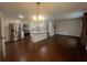 View of the kitchen and living space features stainless appliances and hardwood floors at 920 James Nw Ct, Marietta, GA 30060
