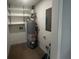Utility room with water heater and shelving, provides ample storage space at 920 James Nw Ct, Marietta, GA 30060