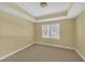 Cozy bedroom features natural light from the window and neutral colored walls at 1210 Spring Branch Ct, Lawrenceville, GA 30045