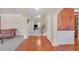 Inviting foyer features hardwood floors, access to the living room, and a staircase at 1210 Spring Branch Ct, Lawrenceville, GA 30045