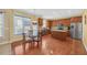 Eat-in kitchen featuring an island, stainless appliances, and a view to the backyard at 1210 Spring Branch Ct, Lawrenceville, GA 30045