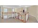 Second floor landing with view down to the first floor at 1210 Spring Branch Ct, Lawrenceville, GA 30045