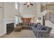 Open-concept living room with fireplace flows into the kitchen, creating a perfect space for entertaining at 1210 Spring Branch Ct, Lawrenceville, GA 30045