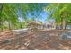 Community picnic pavilion with a grill, set among mature trees and near the tennis courts at 1210 Spring Branch Ct, Lawrenceville, GA 30045
