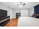 Comfortable main bedroom with hardwood floors, ample closet space, and ceiling fan at 1683 Briarcliff Rd # 6, Atlanta, GA 30306