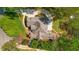 Bird's-eye view showcasing the home's roof, landscaping, deck, and circular driveway at 2675 Misty Morning Ln, Roswell, GA 30076