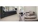 Bedroom with sitting area, large windows, and a built-in bookshelf at 2675 Misty Morning Ln, Roswell, GA 30076