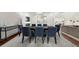 Dining room showcasing a large table, carpet, and view to the Gathering room at 2675 Misty Morning Ln, Roswell, GA 30076