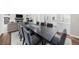 Open concept dining room with a large table and chairs at 2675 Misty Morning Ln, Roswell, GA 30076
