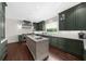 Kitchen featuring a large island, countertops, and stainless steel appliances at 2675 Misty Morning Ln, Roswell, GA 30076