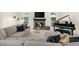 Inviting living room with a fireplace, large windows, sectional sofa, and grand piano at 2675 Misty Morning Ln, Roswell, GA 30076