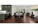 Open concept kitchen and living room with hardwood floors and a dining area at 2675 Misty Morning Ln, Roswell, GA 30076