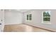Bright, open room offers natural light and ample space for relaxation or productivity at 27 Kensington St, Kingston, GA 30145