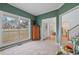 Office room with a large window, a wooden dresser, and carpeted floors at 45 Cherrystone Walk, Suwanee, GA 30024