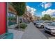 Charming storefronts along a tree-lined street with parked cars at 45 Cherrystone Walk, Suwanee, GA 30024