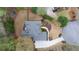 An overhead view of the home displaying the roofline, manicured lawn and mature landscaping at 6935 York Pl, Cumming, GA 30040