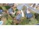 An overhead aerial view of the home and neighborhood showcasing the home's location and landscaping at 6935 York Pl, Cumming, GA 30040