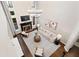 Overhead view of a living room with fireplace, soaring ceilings, and modern decor at 6935 York Pl, Cumming, GA 30040