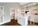 Cozy office with custom built-ins, hardwood floors, with a view to an adjoining bedroom at 6935 York Pl, Cumming, GA 30040