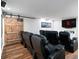 Home theater room with reclining seats, projector, and wall-mounted speakers at 6935 York Pl, Cumming, GA 30040