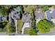 Drone shot of upscale neighborhood highlighting manicured lawns, pools, and luxury home exteriors at 931 Fairfield Dr, Marietta, GA 30068