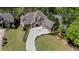 Stunning aerial view of a luxurious home showcasing its elegant design, landscaping, and circular driveway at 931 Fairfield Dr, Marietta, GA 30068