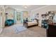 Bright bedroom with a comfortable bed, area rug and colorful decor, perfect for  at 931 Fairfield Dr, Marietta, GA 30068