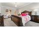 Bedroom with carpet, art, bed and hardwood furnishings at 931 Fairfield Dr, Marietta, GA 30068