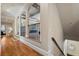Hallway features an arched entryway, hardwood floors, and staircase leading to upper level at 931 Fairfield Dr, Marietta, GA 30068