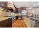 Gourmet kitchen with granite countertops, stainless steel appliances, and custom cabinets at 931 Fairfield Dr, Marietta, GA 30068