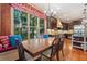 A gourmet kitchen with dark cabinets and a breakfast nook with large windows at 931 Fairfield Dr, Marietta, GA 30068