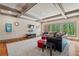 Spacious living room with hardwood and carpet flooring and coffered ceiling at 931 Fairfield Dr, Marietta, GA 30068