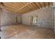 Covered brick patio featuring a stained wood ceiling, brick siding and french doors to yard at 931 Fairfield Dr, Marietta, GA 30068