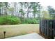 Expansive backyard featuring a spacious lawn and privacy fence and natural surroundings at 1905 Granville Dr, Lawrenceville, GA 30043