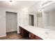 Bathroom featuring double sinks and wooden cabinets at 1905 Granville Dr, Lawrenceville, GA 30043
